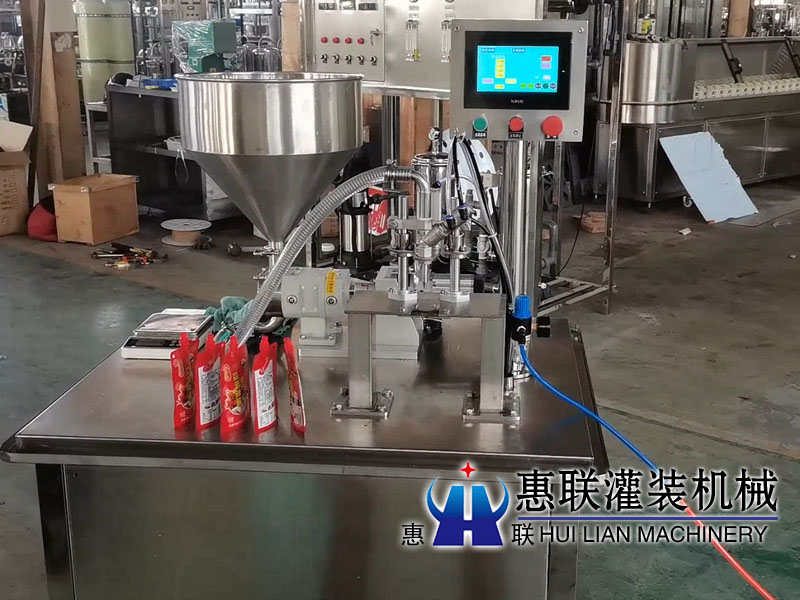 半自動轉(zhuǎn)子泵自立袋灌裝機